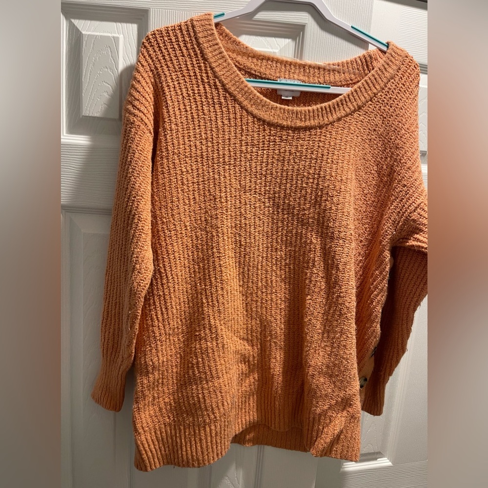 Isabel- Medium peach colored oversized sweater with side buttons